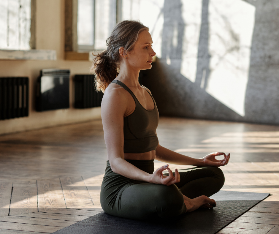 Woman sitting in sukhasana